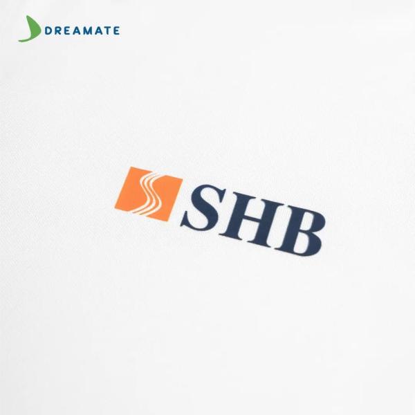 Áo polo đồng phục vàng trắng SHB