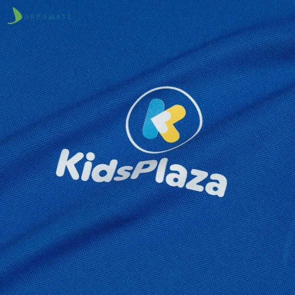 Áo polo đồng phục xanh phối vàng Kids Plaza